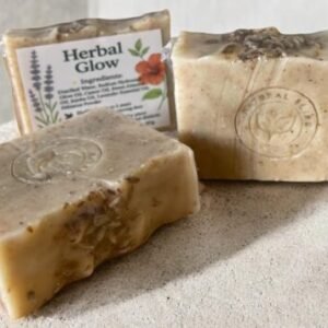 Herbal Glow Soap 🌿 ✨ Ingredients: Distilled Water, Sodium Hydroxide, Olive Oil, Castor Oil, Sweet Almond Oil, Jojoba Oil, Lavender Essential Oil, Hibiscus Powder 90g